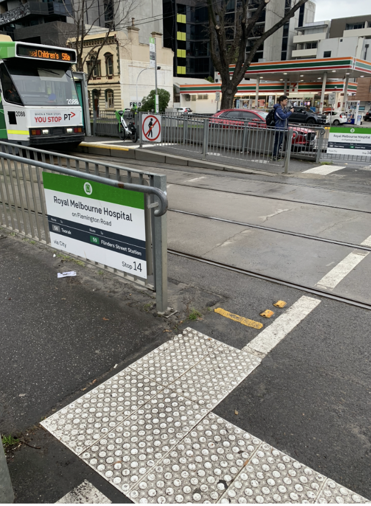 Image description: Photo of Royal Melbourne Hospital 14 tram stop. This tram stop is accessible and has ramp access on both sides to Flemington Road.